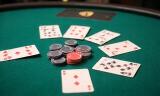Poker table with cards and poker chips